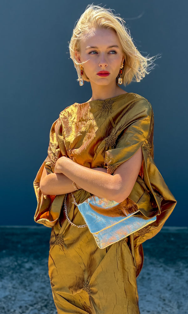golden dress reithose Dripping in gold. #ryanpatros